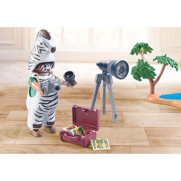 Photographer with Zebras