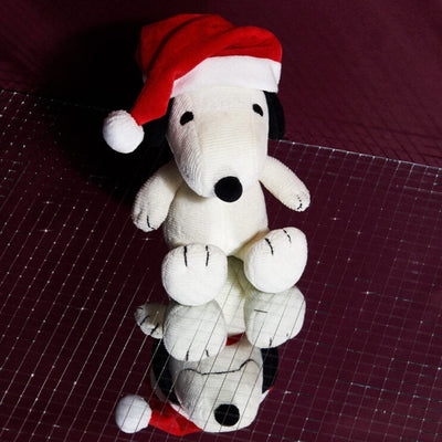 Snoopy Sitting with Christmas Hat
